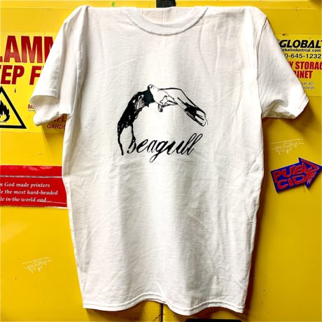Hand silkscreened shirts made in NYC for Seagull Salon